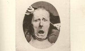 Image of a picture from Darwin's book on emotions showing a man with a fearful face.